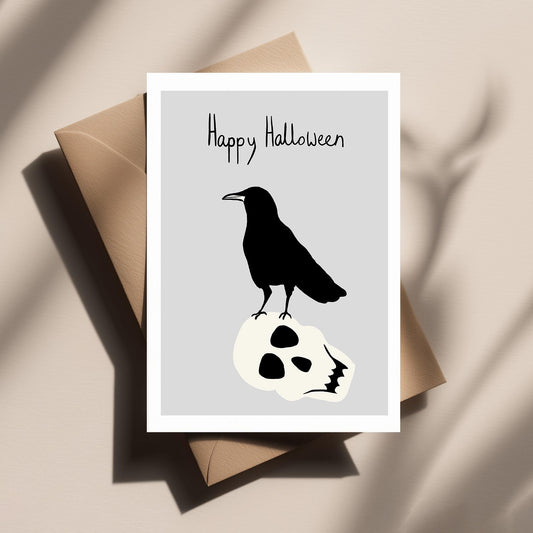Raven on a Skull – Cute, Spooky, Quirky and Funny Halloween Greeting Card for Friends, Family & Cat Lovers. Gifts for Him or Her.